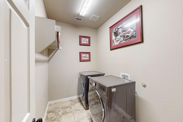 4001 Dellman Dr, Fort Worth, TX 76262 - washroom with washing machine and clothes dryer, baseboards, visible vents, and laundry area