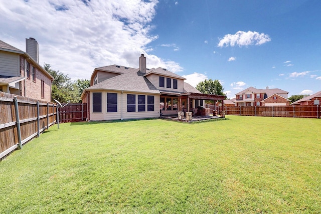 4001 Dellman Dr, Fort Worth, TX 76262 - rear view of property with roof with shingles, a fenced backyard, a chimney, a yard, and a patio