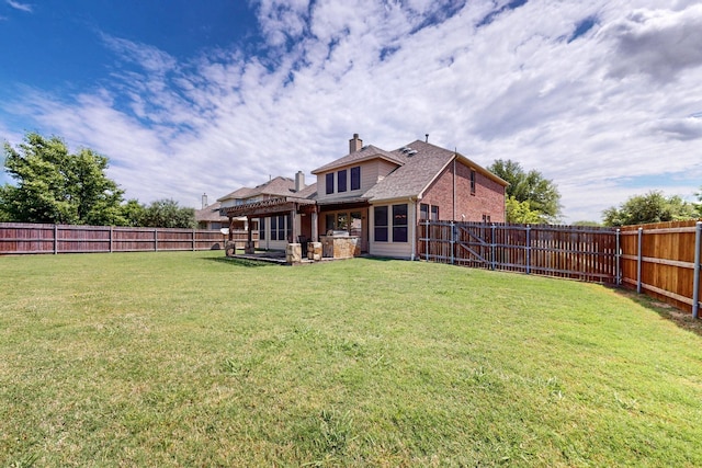 4001 Dellman Dr, Fort Worth, TX 76262 - rear view of property featuring a chimney, brick siding, a fenced backyard, and a lawn