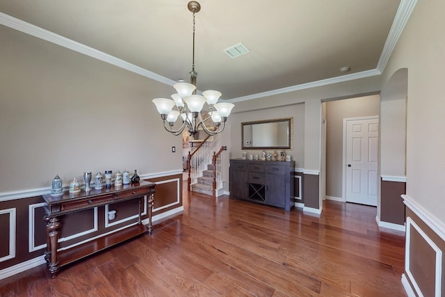 4001 Dellman Dr, Fort Worth, TX 76262 - dining area featuring crown molding, a chandelier, wood finished floors, and visible vents