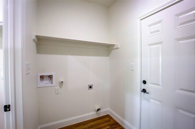 laundry room featuring dark wood-style flooring, baseboards, washer hookup, electric dryer hookup, and laundry area
