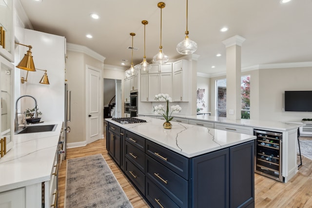 881 Saint James Ct, Fairview, TX 75069 - kitchen featuring wine cooler, a sink, white cabinetry, light wood finished floors, and a kitchen island