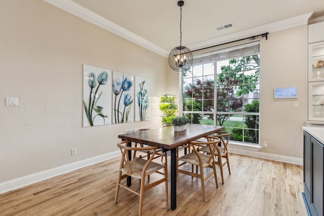 881 Saint James Ct, Fairview, TX 75069 - dining area featuring a chandelier, crown molding, baseboards, and light wood-style flooring