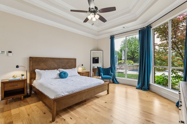 881 Saint James Ct, Fairview, TX 75069 - bedroom with a raised ceiling, ornamental molding, light wood-type flooring, and ceiling fan