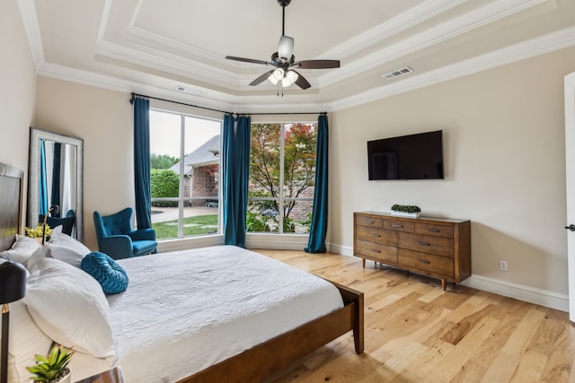 881 Saint James Ct, Fairview, TX 75069 - bedroom with a raised ceiling, crown molding, wood finished floors, baseboards, and ceiling fan