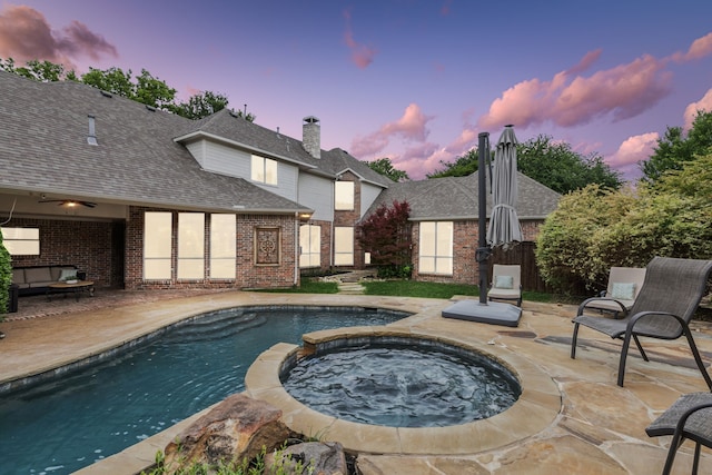 881 Saint James Ct, Fairview, TX 75069 - pool at dusk with a patio and a pool with connected hot tub