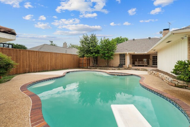 view of pool featuring a fenced in pool, a fenced backyard, and a patio area