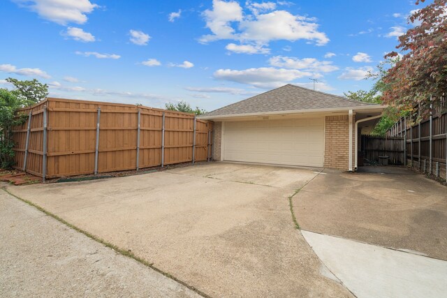 detached garage with fence