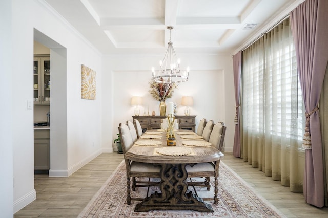 318 Waters Edge Dr, Argyle, TX 76226 - dining room with light wood-type flooring, visible vents, an inviting chandelier, coffered ceiling, and beamed ceiling