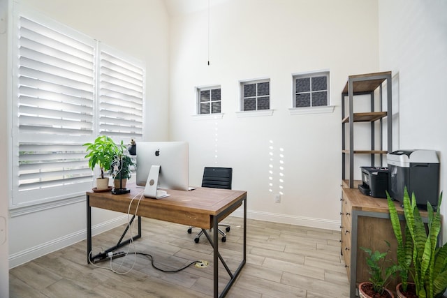 318 Waters Edge Dr, Argyle, TX 76226 - office area with baseboards and light wood finished floors