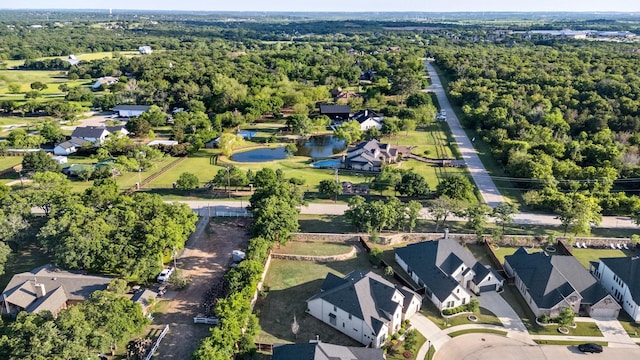 318 Waters Edge Dr, Argyle, TX 76226 - bird's eye view with a residential view, a forest view, and a water view
