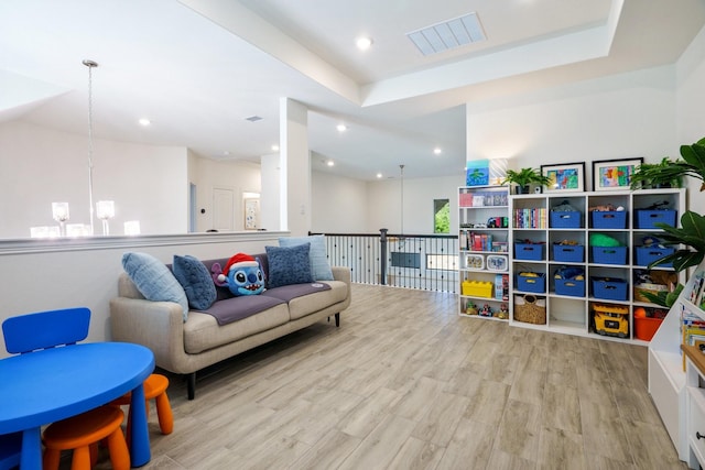 318 Waters Edge Dr, Argyle, TX 76226 - rec room featuring wood finished floors, visible vents, an inviting chandelier, and recessed lighting