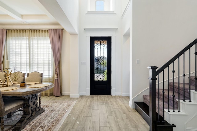 318 Waters Edge Dr, Argyle, TX 76226 - entrance foyer with baseboards, wood finished floors, and stairway