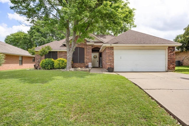 ranch-style house with brick siding, an attached garage, a front lawn, and concrete driveway