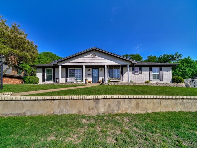 ranch-style house with a front lawn