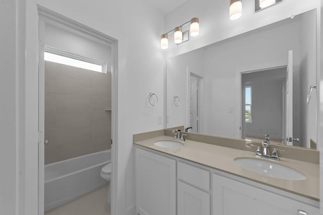 3541 Wardie Pl, Frisco, TX 75033 - full bathroom with tile patterned flooring, a sink, double vanity, and toilet