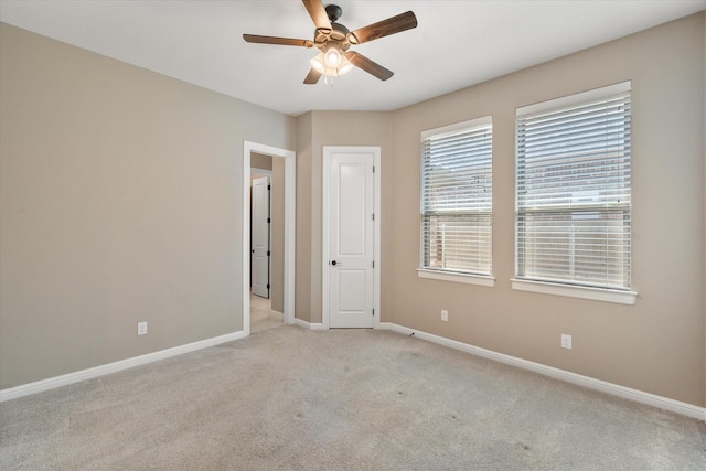 212 Rock Tree Ct, Mansfield, TX 76063 - empty room with light colored carpet, ceiling fan, and baseboards