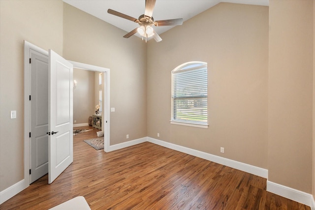 212 Rock Tree Ct, Mansfield, TX 76063 - empty room with vaulted ceiling, ceiling fan, light wood-style floors, and baseboards