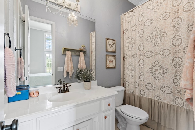 full bath featuring toilet and vanity