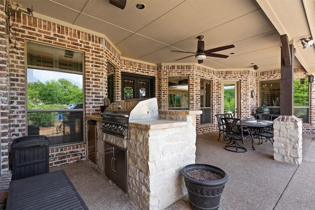 view of patio / terrace featuring ceiling fan, outdoor dining space, and area for grilling