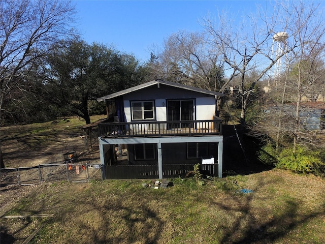 242 Club Park Ct, East Tawakoni, TX 75472 - back of house with a gate and fence