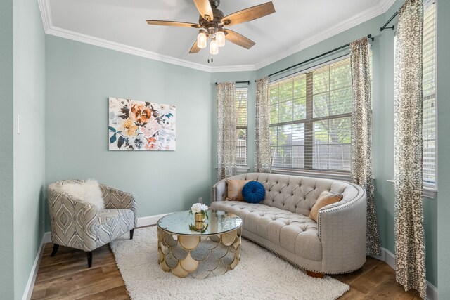32 Royal Oaks Cir, Denton, TX 76210 - living area with baseboards, wood finished floors, ornamental molding, and a ceiling fan