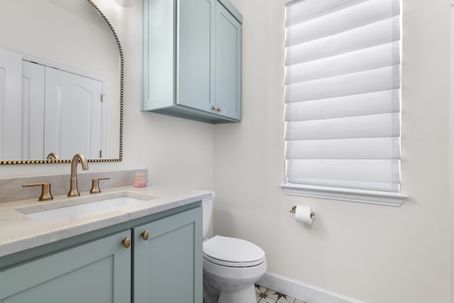 32 Royal Oaks Cir, Denton, TX 76210 - bathroom featuring vanity, toilet, and baseboards