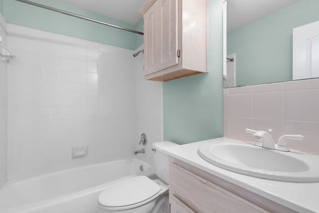 32 Royal Oaks Cir, Denton, TX 76210 - full bathroom featuring toilet, vanity, shower / washtub combination, and decorative backsplash
