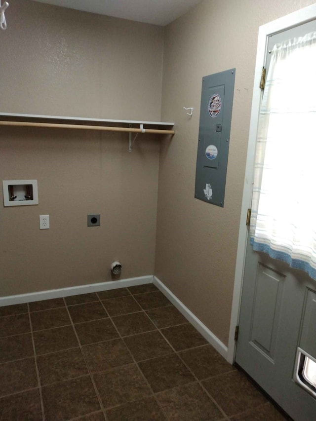 washroom featuring hookup for a washing machine, hookup for an electric dryer, plenty of natural light, and laundry area