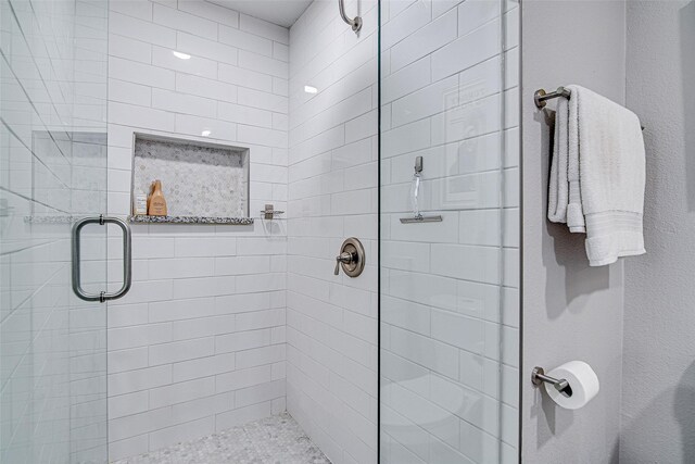 bathroom featuring a stall shower