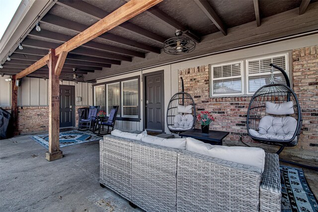 view of patio featuring an outdoor living space and a ceiling fan