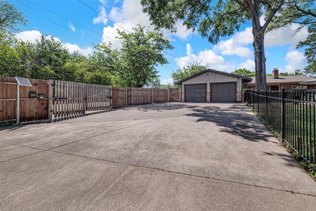 exterior space featuring fence and a gate