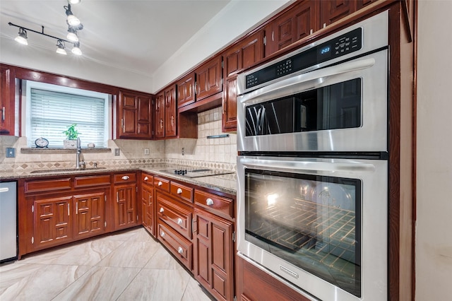 2307 Castle Rock Rd, Carrollton, TX 75007 - kitchen featuring a sink, double oven, black electric stovetop, and decorative backsplash
