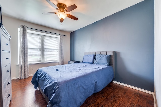 2307 Castle Rock Rd, Carrollton, TX 75007 - bedroom with wood finished floors, baseboards, and ceiling fan