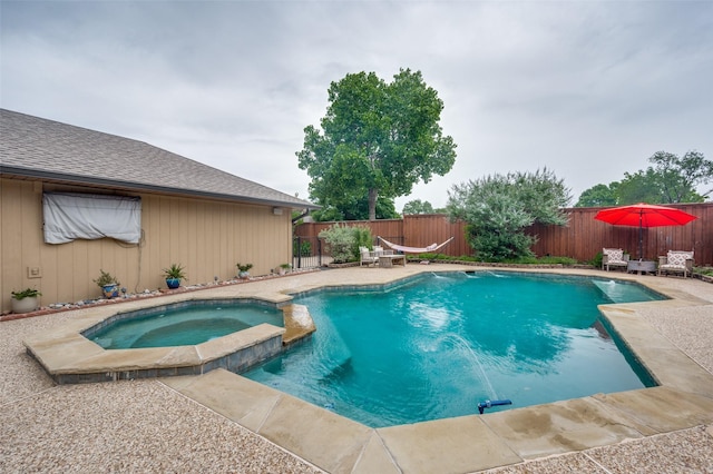 2307 Castle Rock Rd, Carrollton, TX 75007 - view of swimming pool with a fenced backyard, a pool with connected hot tub, and a patio