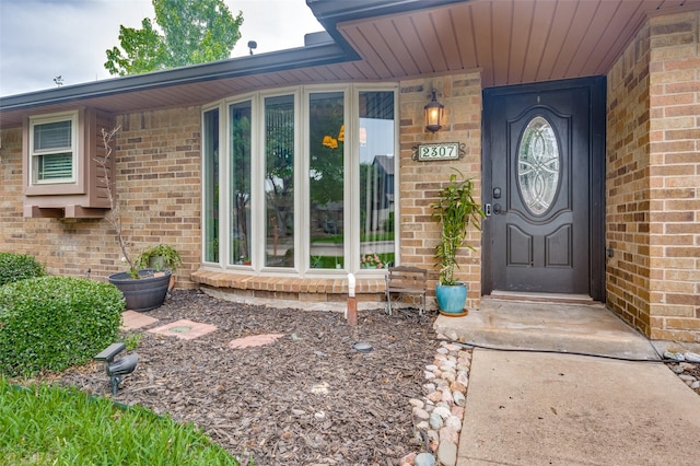 2307 Castle Rock Rd, Carrollton, TX 75007 - property entrance featuring brick siding