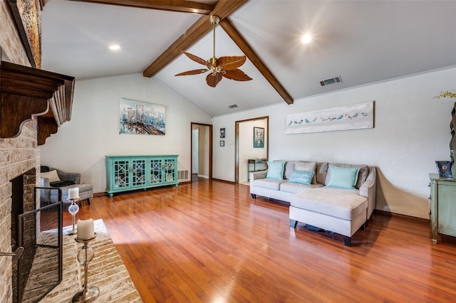 2307 Castle Rock Rd, Carrollton, TX 75007 - living room featuring a ceiling fan, wood finished floors, baseboards, and a fireplace
