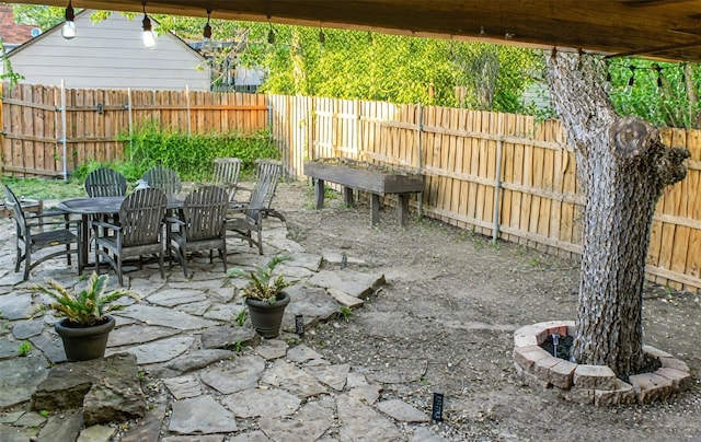 4024 Calmont Ave, Fort Worth, TX 76107 - view of patio / terrace featuring a fenced backyard and outdoor dining space