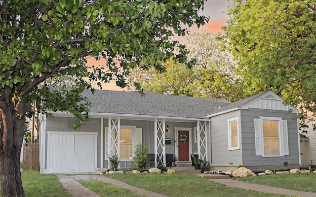 4024 Calmont Ave, Fort Worth, TX 76107 - ranch-style house with a lawn, roof with shingles, a porch, and board and batten siding