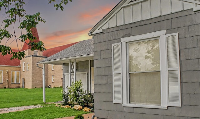 4024 Calmont Ave, Fort Worth, TX 76107 - view of home's exterior featuring board and batten siding, a lawn, and roof with shingles