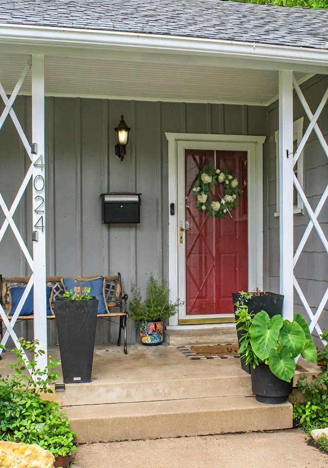 4024 Calmont Ave, Fort Worth, TX 76107 - property entrance featuring a porch, board and batten siding, and a shingled roof