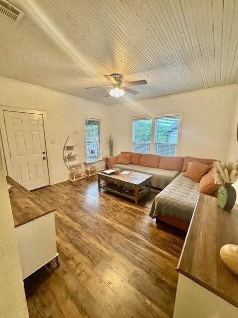 715 W Ball St, Weatherford, TX 76086 - living room featuring hardwood / wood-style floors, ceiling fan, and wooden ceiling