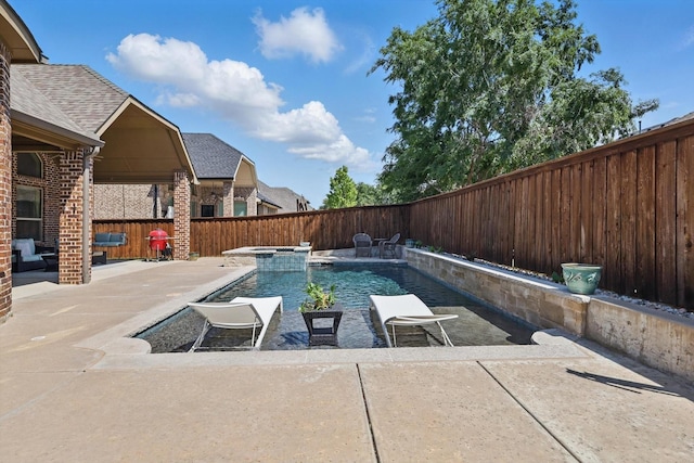 8336 Pitkin Rd, Frisco, TX 75036 - view of swimming pool featuring a patio area, a fenced backyard, and a pool with connected hot tub