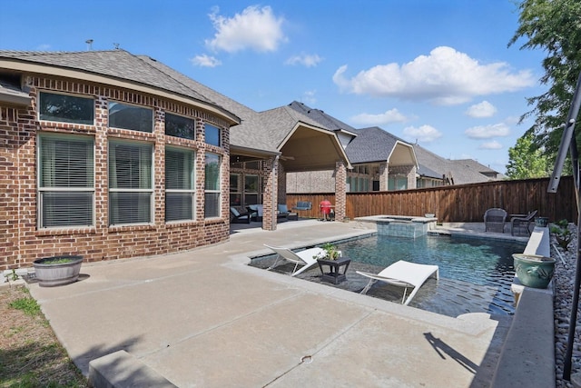 8336 Pitkin Rd, Frisco, TX 75036 - view of swimming pool with a patio, a fenced backyard, and a pool with connected hot tub