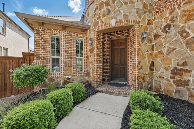 8336 Pitkin Rd, Frisco, TX 75036 - doorway to property with brick siding and stone siding