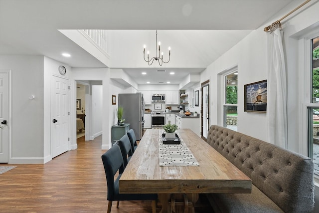 1457 Woodlawn Ct, Keller, TX 76262 - dining area with a chandelier, light wood-type flooring, baseboards, and recessed lighting