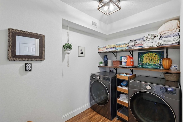 1457 Woodlawn Ct, Keller, TX 76262 - washroom with wood finished floors, baseboards, and independent washer and dryer