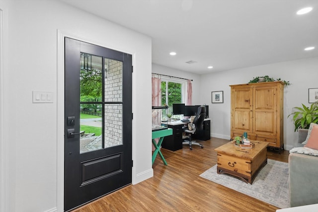 office with recessed lighting, baseboards, and wood finished floors