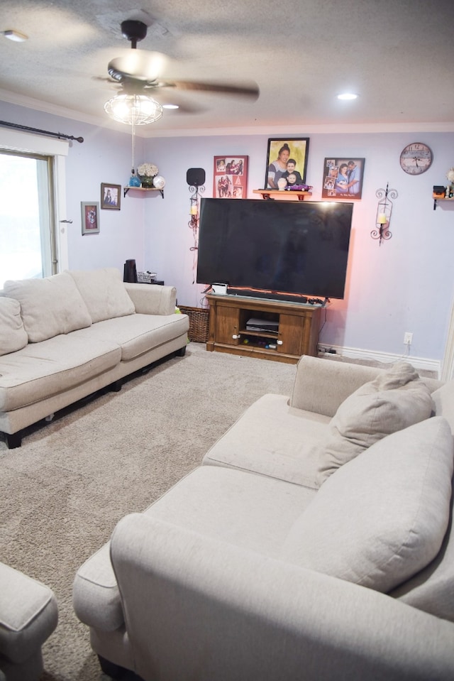 living room with carpet floors and a ceiling fan