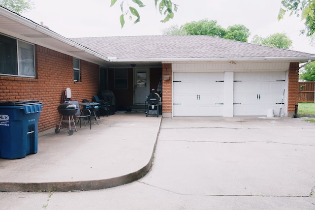 garage with driveway